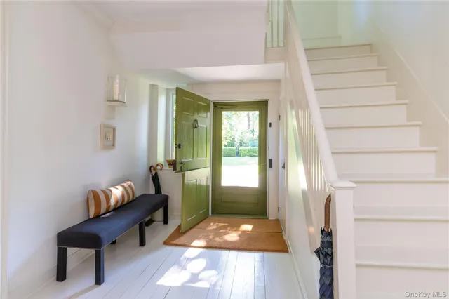 a room with furniture and a window