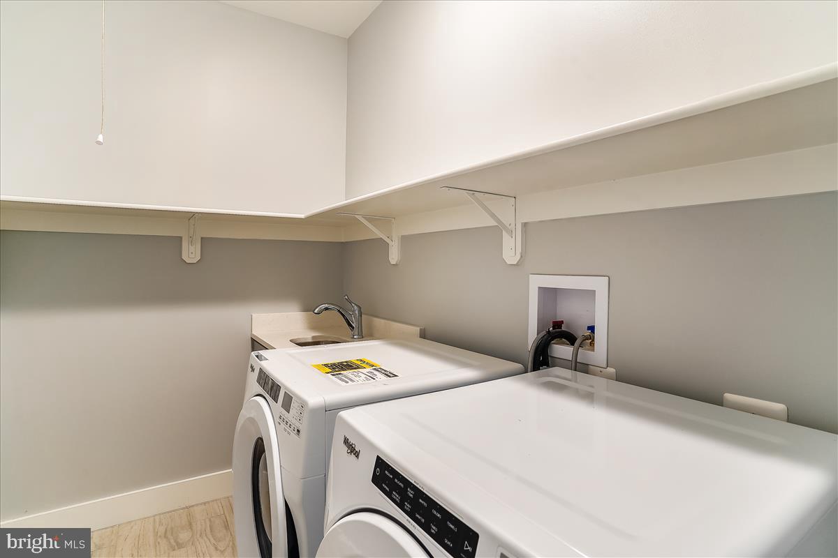 2722 Jennings Road Kensington, MD 20895 - Photo 43 of 58 Upper level laundry room with washer/Dryer