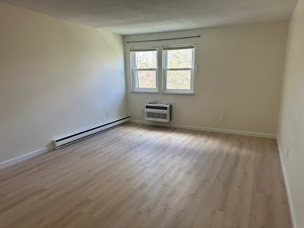 an empty room with windows