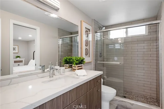 a bathroom with a bathtub and shower