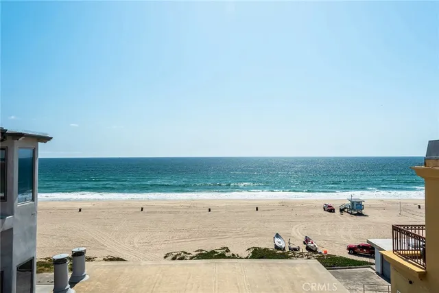 a kitchen with granite countertop a stove sink and cabinets