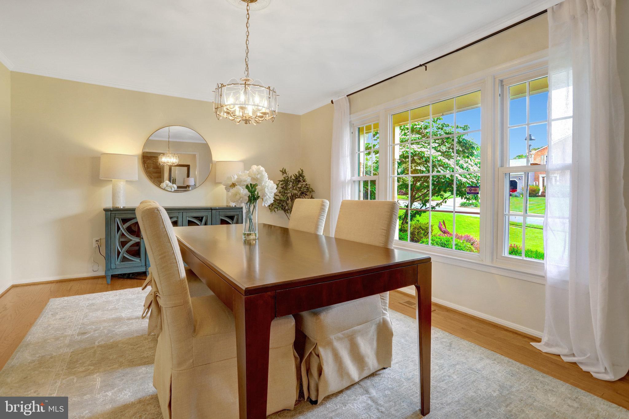 7006 Maple Tree Lane Springfield, VA 22152 - Photo 12 of 49 a view of a dining room with furniture window and outside view