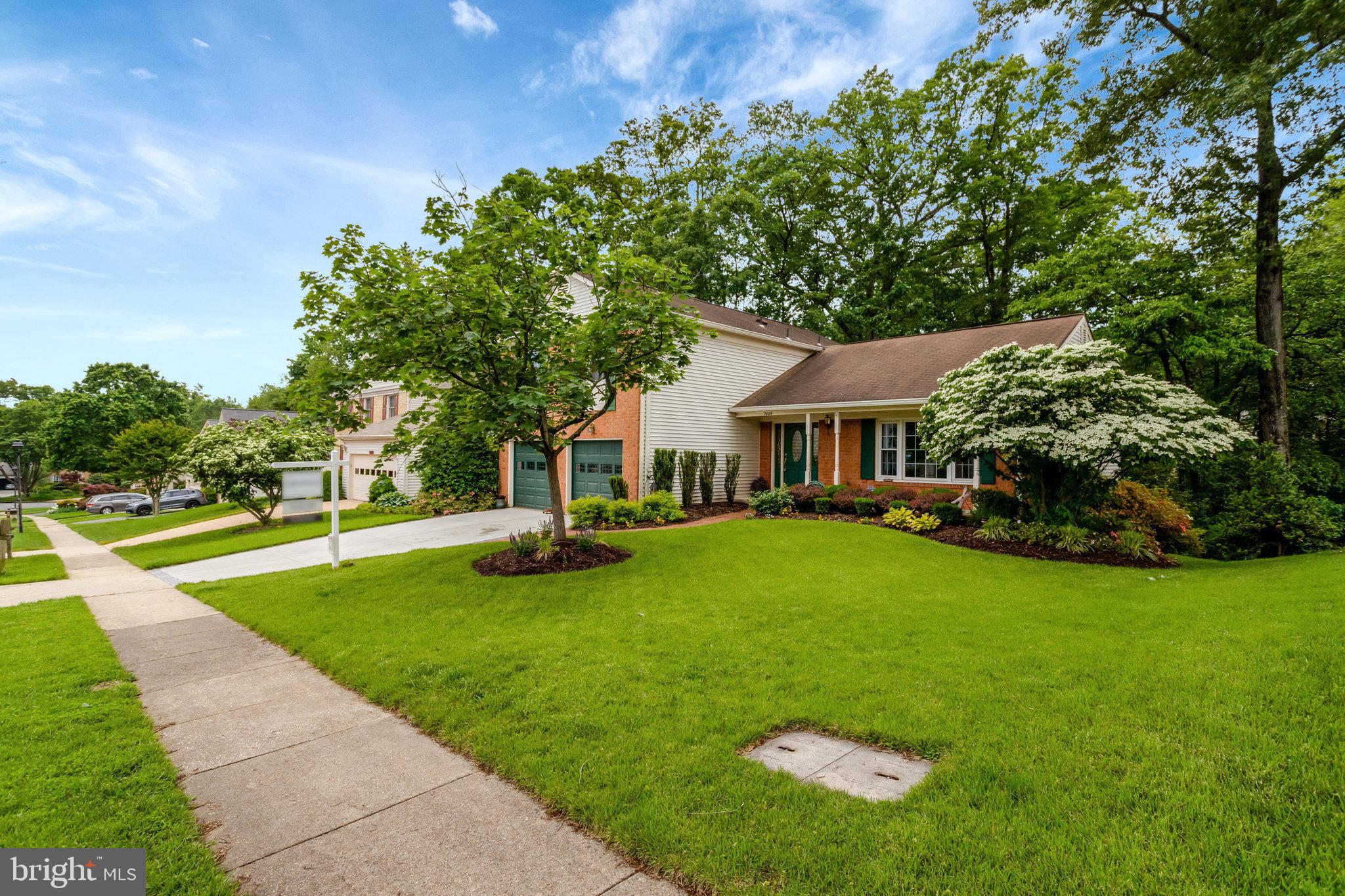 7006 Maple Tree Lane Springfield, VA 22152 - Photo 2 of 49 a view of a house with a yard porch and sitting area