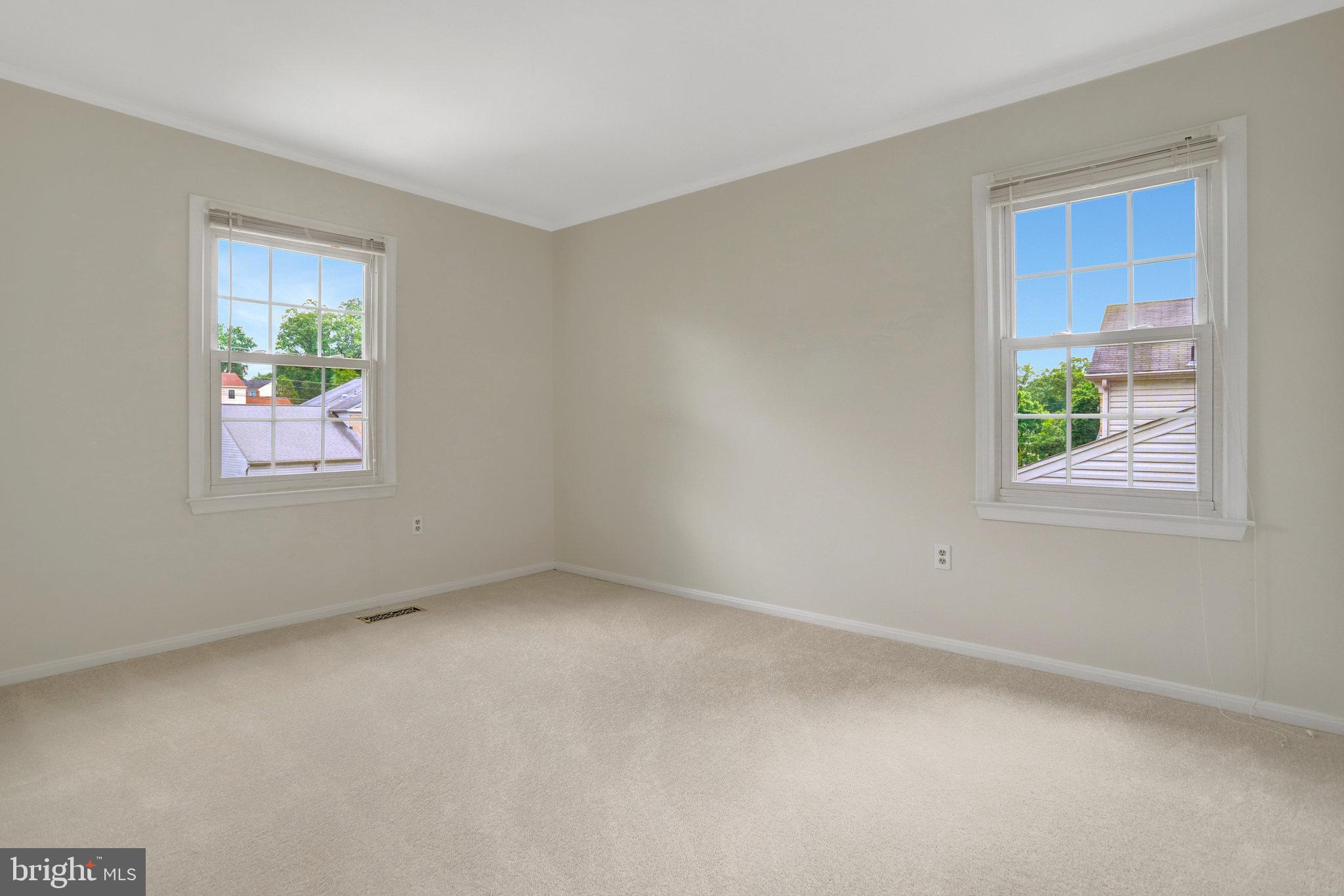 7006 Maple Tree Lane Springfield, VA 22152 - Photo 29 of 49 an empty room with windows