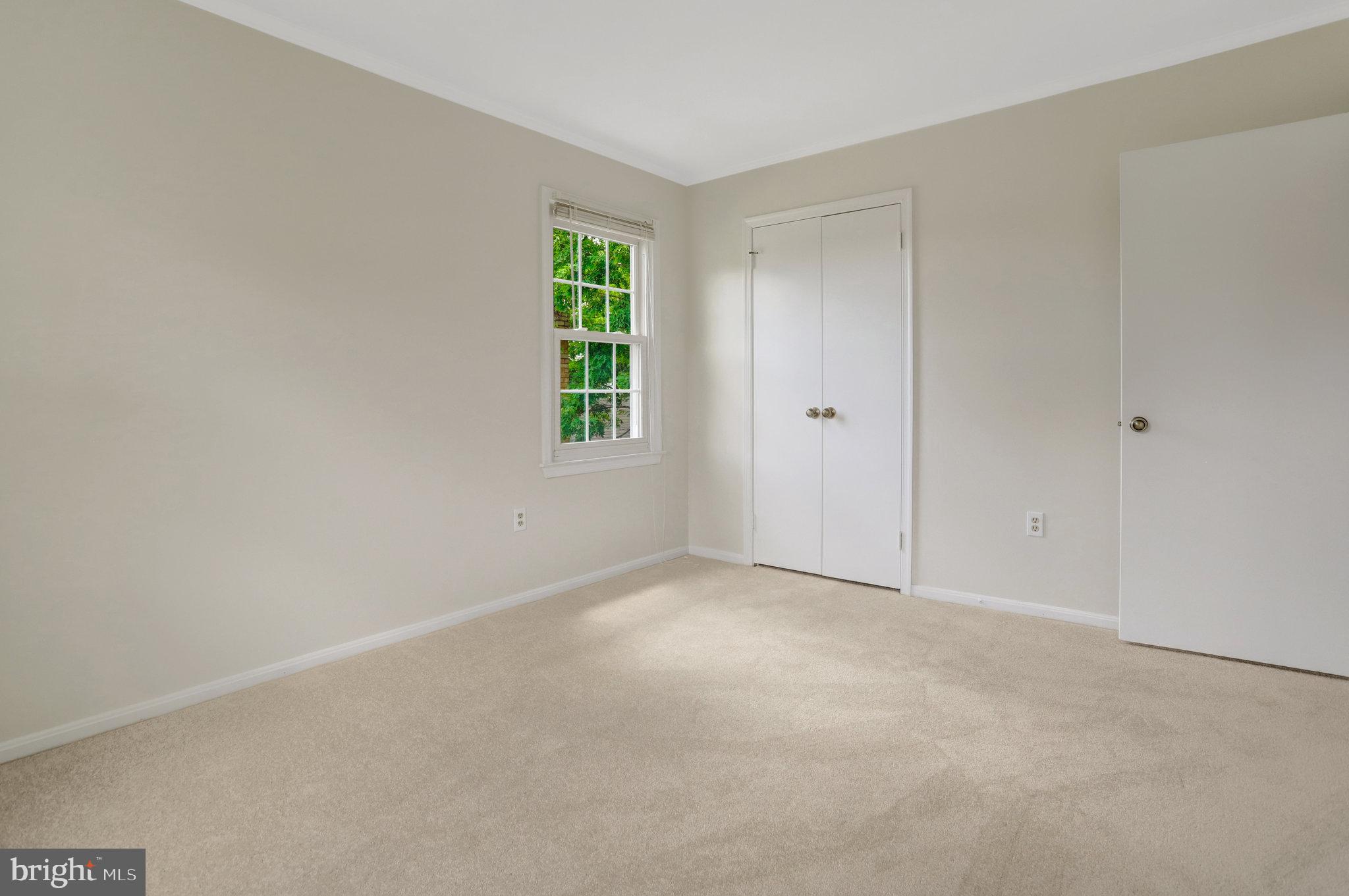 7006 Maple Tree Lane Springfield, VA 22152 - Photo 31 of 49 a view of an empty room with a window