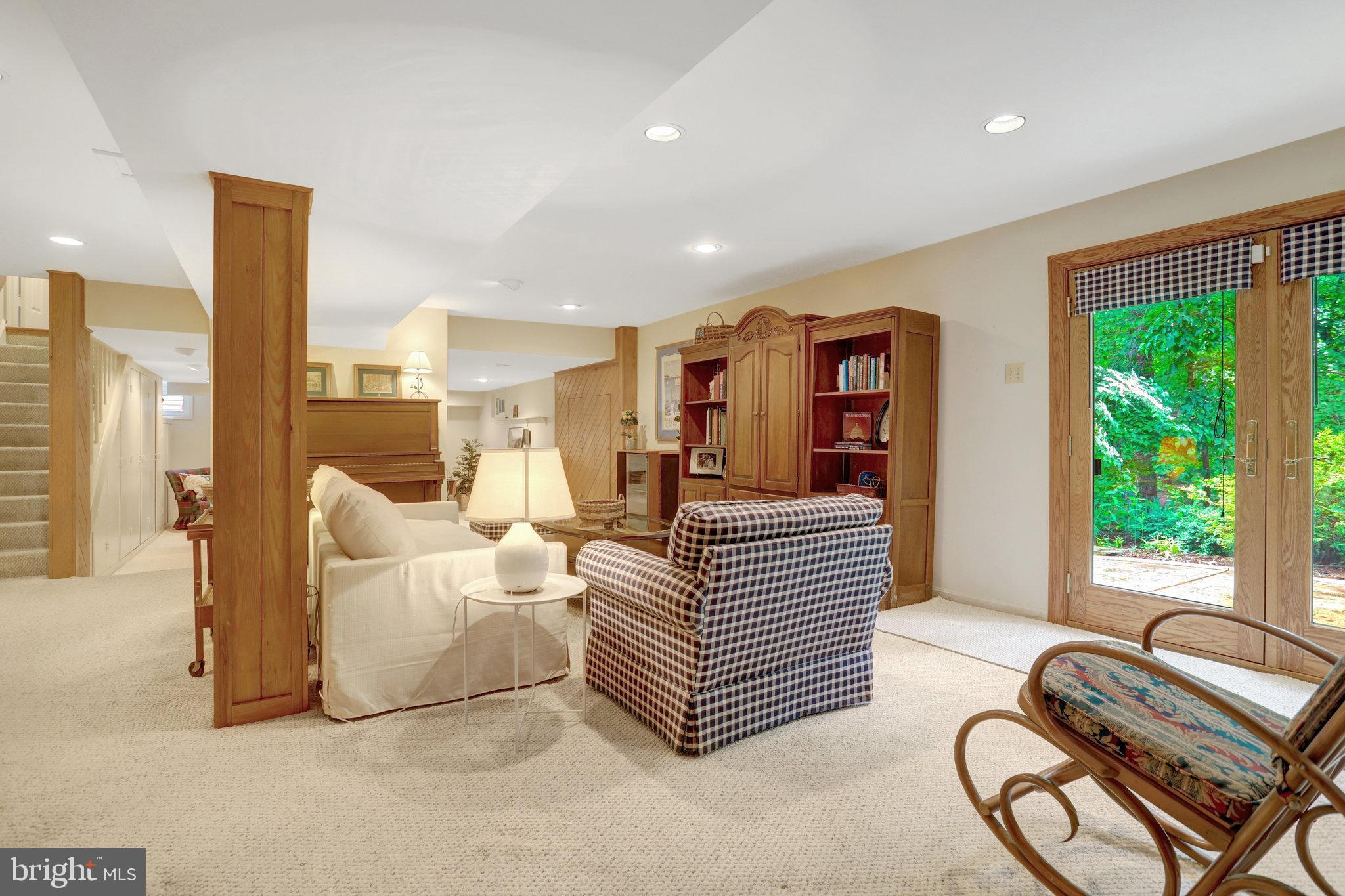 7006 Maple Tree Lane Springfield, VA 22152 - Photo 35 of 49 a room with furniture and a large window