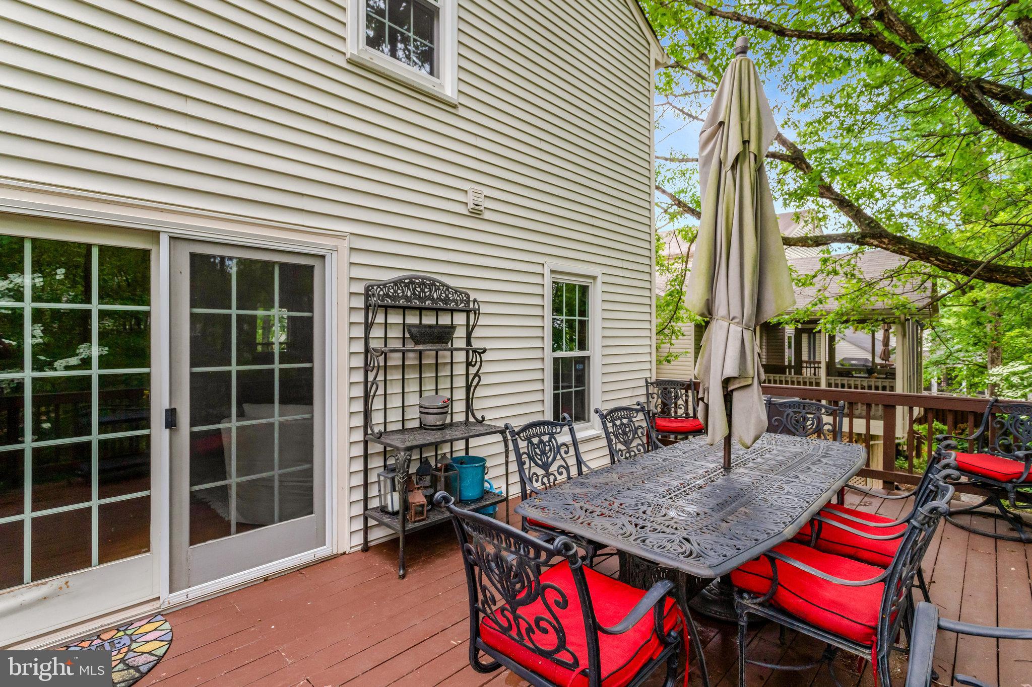 7006 Maple Tree Lane Springfield, VA 22152 - Photo 44 of 49 a backyard of a house with seating space