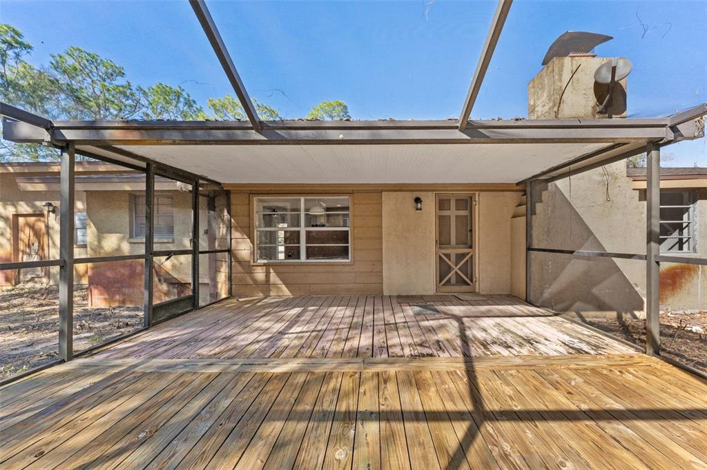 27814 Quail View Lane Wesley Chapel, FL 33544 - Photo 22 of 26 a front view of a house with wooden floor