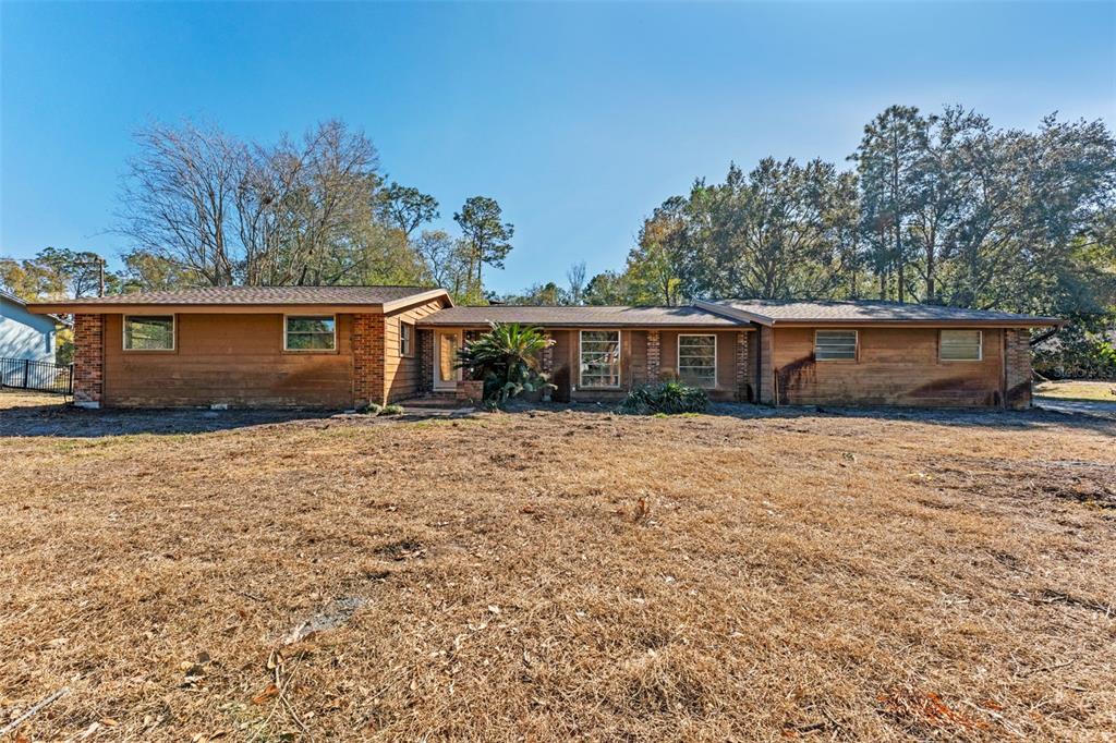 27814 Quail View Lane Wesley Chapel, FL 33544 - Photo 3 of 26 front view of a house with a yard