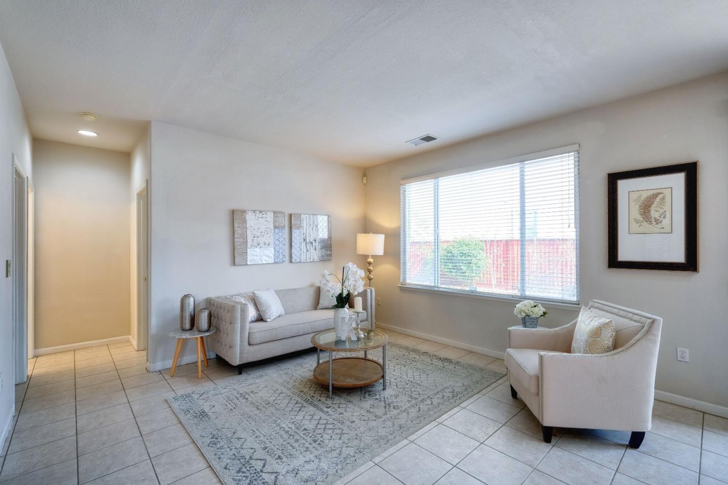 2194 Sierra Road San Jose, CA 95131 - Photo 16 of 45 a living room with furniture and a large window
