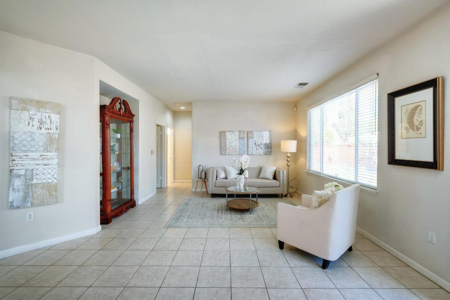 2194 Sierra Road San Jose, CA 95131 - Photo 19 of 45 a living room with furniture and large windows