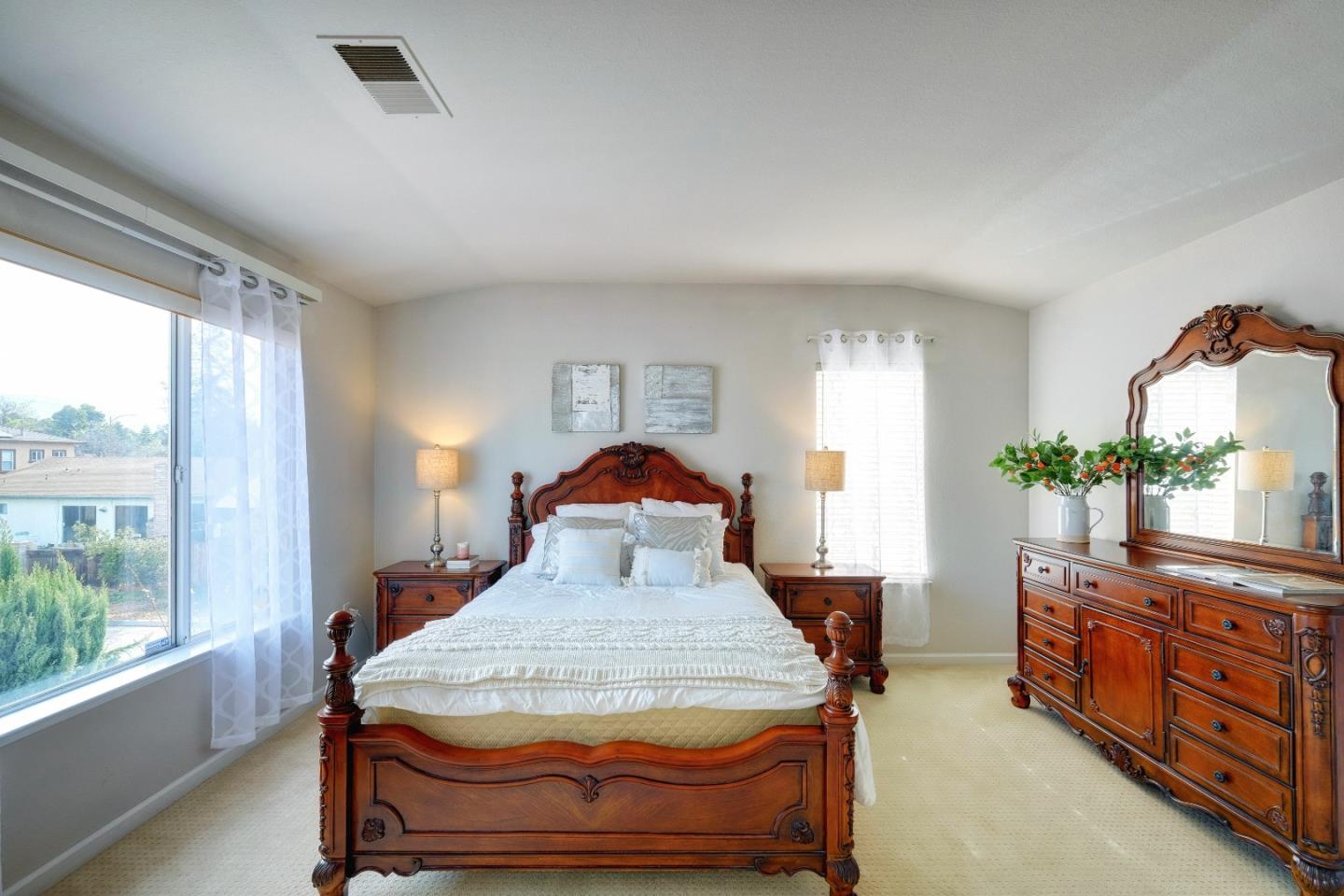 2194 Sierra Road San Jose, CA 95131 - Photo 23 of 45 a bed sitting in a room next to a window