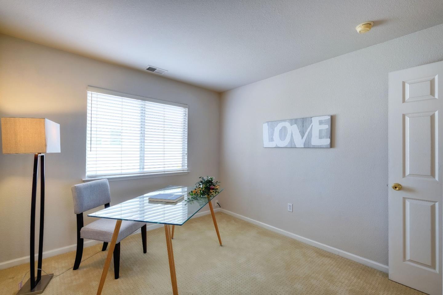 2194 Sierra Road San Jose, CA 95131 - Photo 29 of 45 a workspace with furniture and a lamp