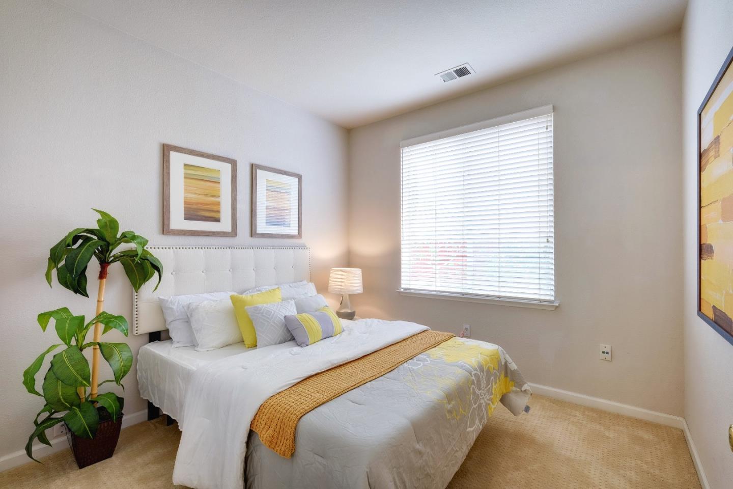 2194 Sierra Road San Jose, CA 95131 - Photo 31 of 45 a bedroom with bed and a window