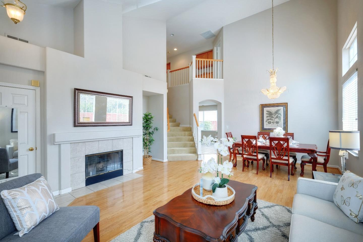 2194 Sierra Road San Jose, CA 95131 - Photo 6 of 45 a living room with furniture kitchen view and a fireplace