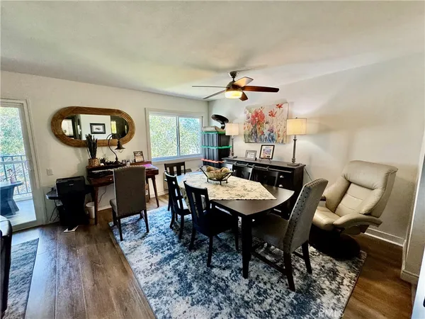 a kitchen with a sink appliances and cabinets
