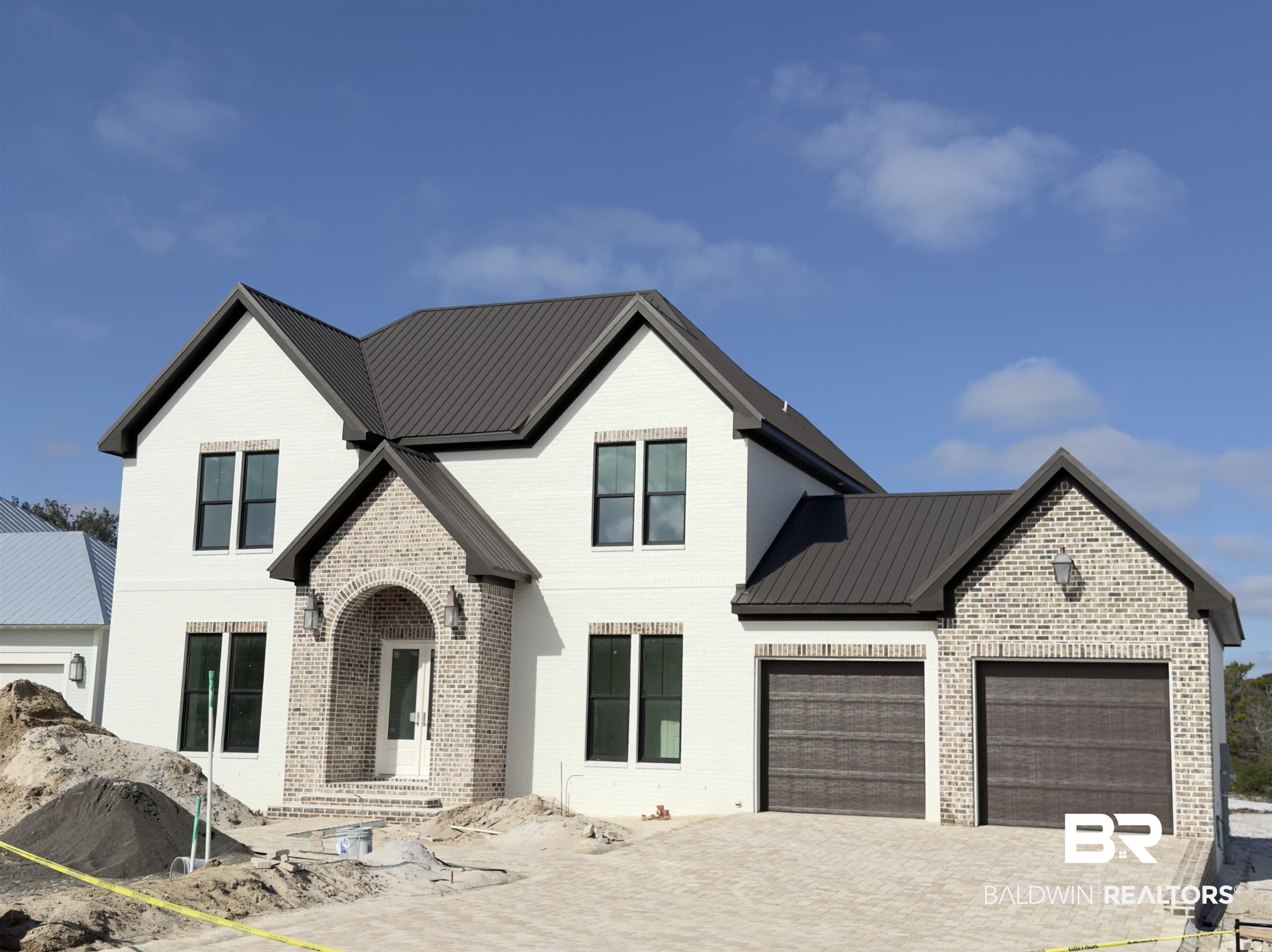 30327 River Road Orange Beach, AL 36561 - Photo 1 of 4 View of front of house featuring a garage