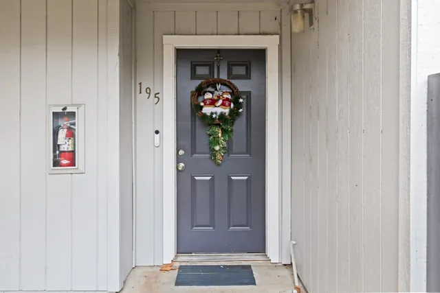 a utility room with washer and dryer