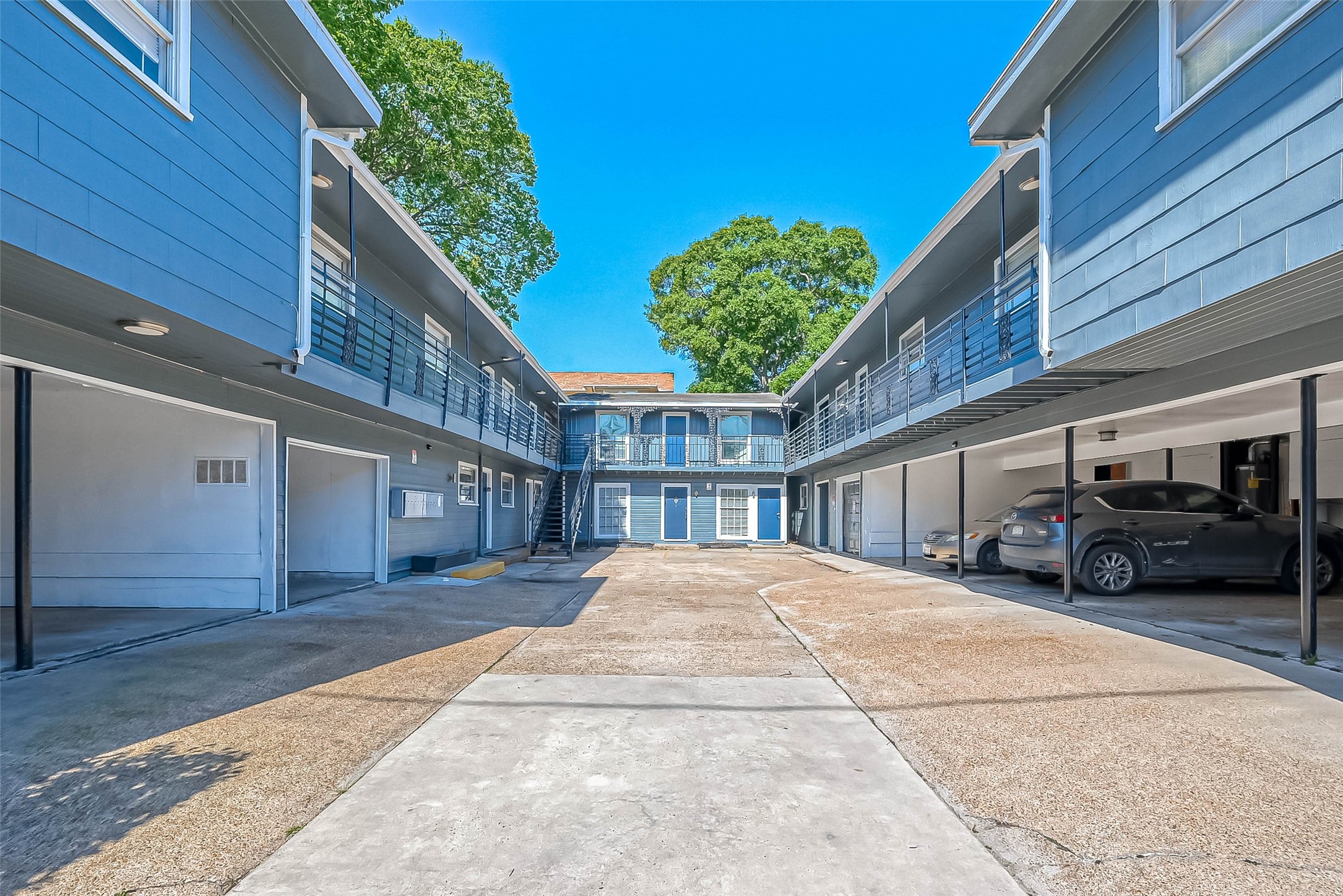 2420 McDuffie Street, Unit 1A Houston, TX 77019 - Photo 2 of 11 a view of a car park in front of house