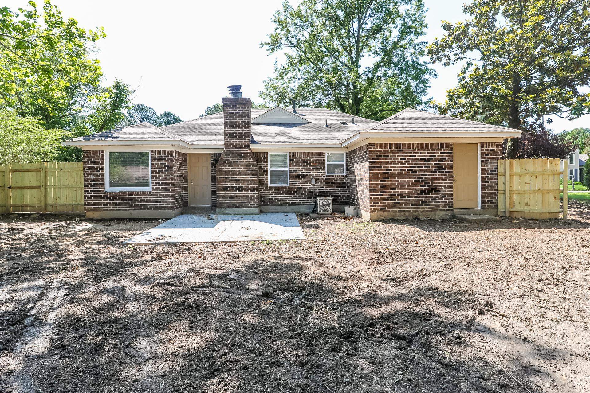 6076 Elk Grove Road Memphis, TN 38115 - Photo 14 of 15 a front view of a house with a yard