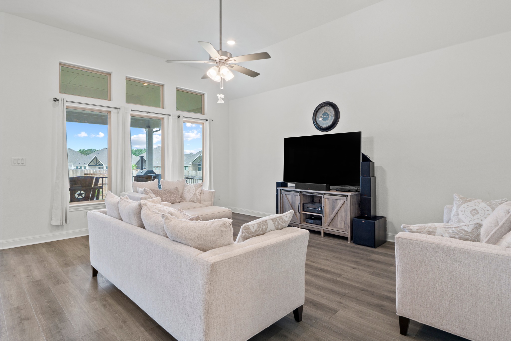 271 Tubman Drive Kyle, TX 78640 - Photo 4 of 40 a living room with furniture and a flat screen tv