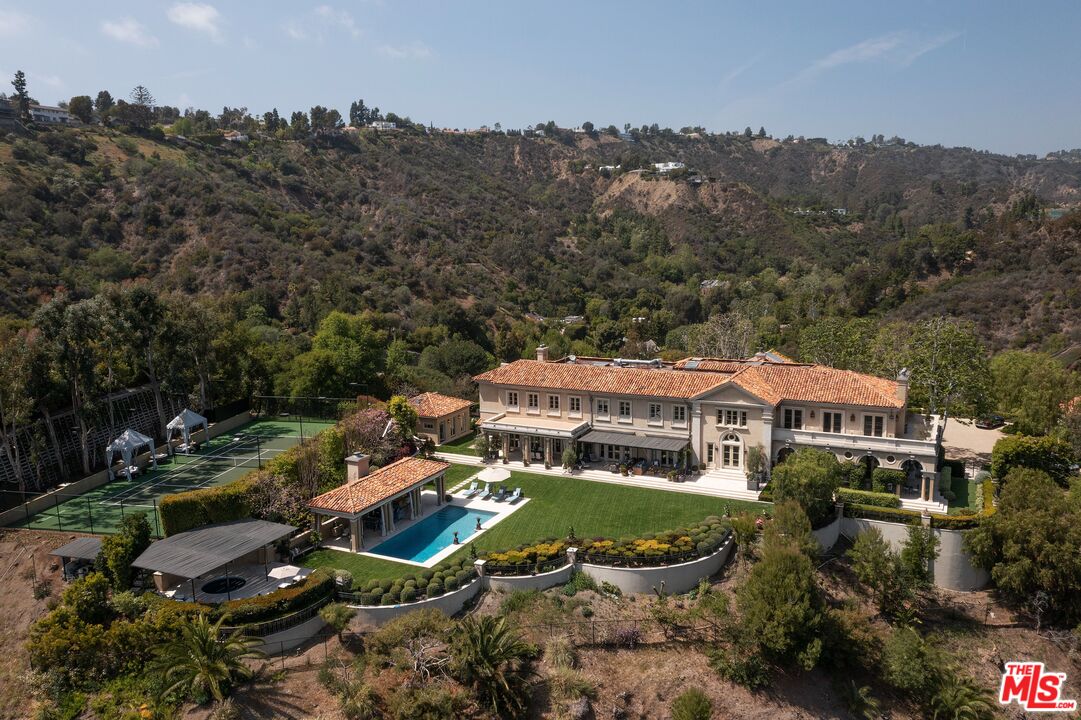 10702 Levico Way Los Angeles, CA 90077 - Photo 23 of 35 an aerial view of a house with a garden
