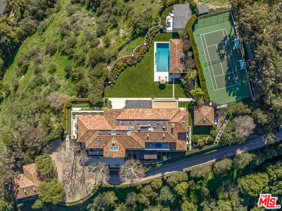 10702 Levico Way Los Angeles, CA 90077 - Photo 30 of 35 an aerial view of a house with a garden