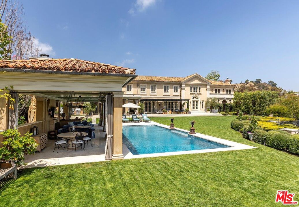 10702 Levico Way Los Angeles, CA 90077 - Photo 31 of 35 a view of house with a swimming pool