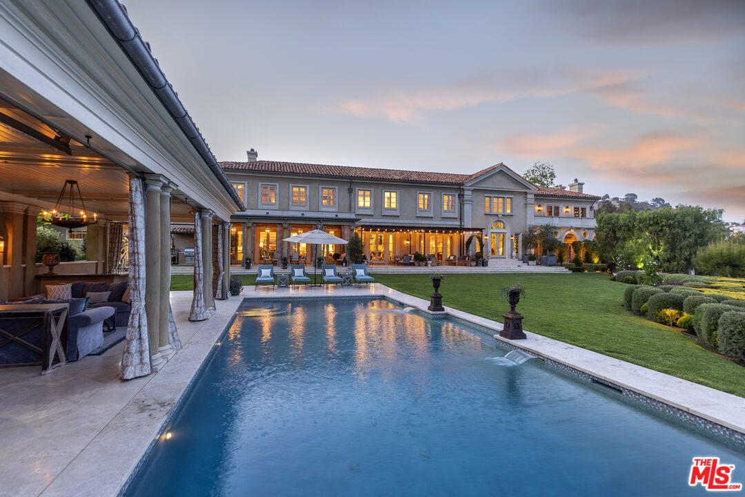 10702 Levico Way Los Angeles, CA 90077 - Photo 32 of 35 a view of a house with a swimming pool