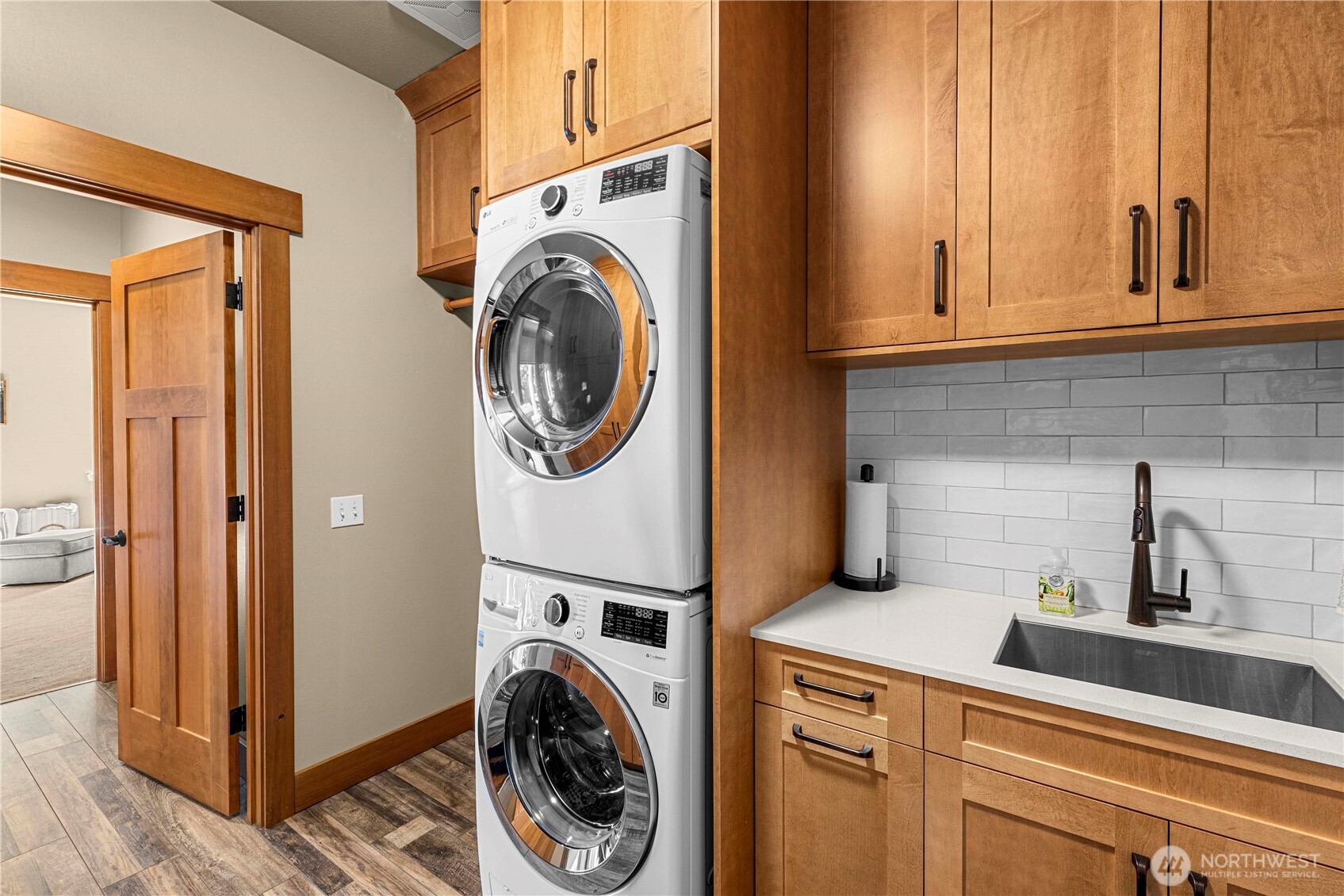 6533 Forest Ridge Drive Wenatchee, WA 98801 - Photo 16 of 37 a view of a storage and utility room with washer and dryer