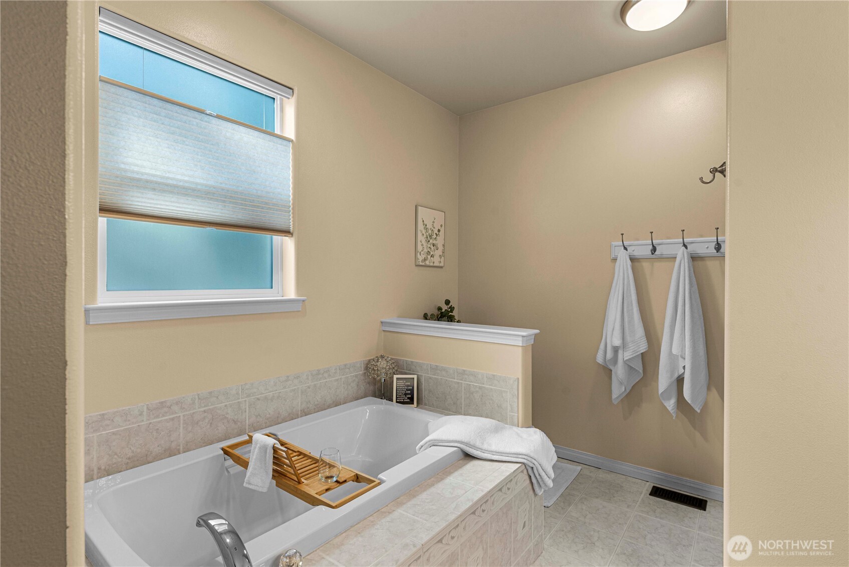 6533 Forest Ridge Drive Wenatchee, WA 98801 - Photo 24 of 37 a bathroom with a sink and a mirror