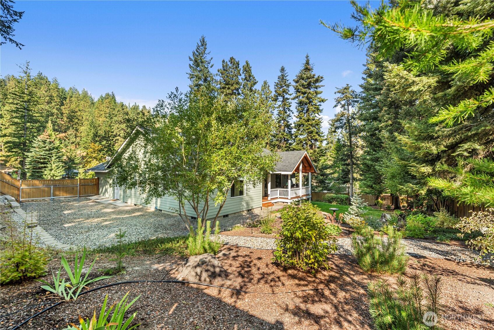 6533 Forest Ridge Drive Wenatchee, WA 98801 - Photo 32 of 37 a front view of a house with a yard