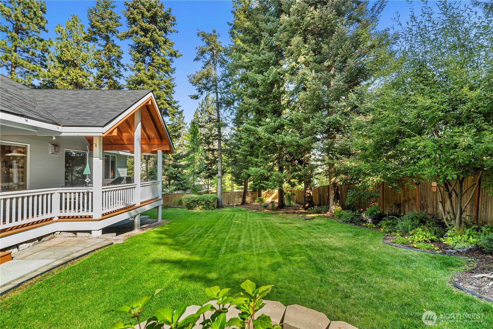 6533 Forest Ridge Drive Wenatchee, WA 98801 - Photo 34 of 37 a view of a house with a backyard