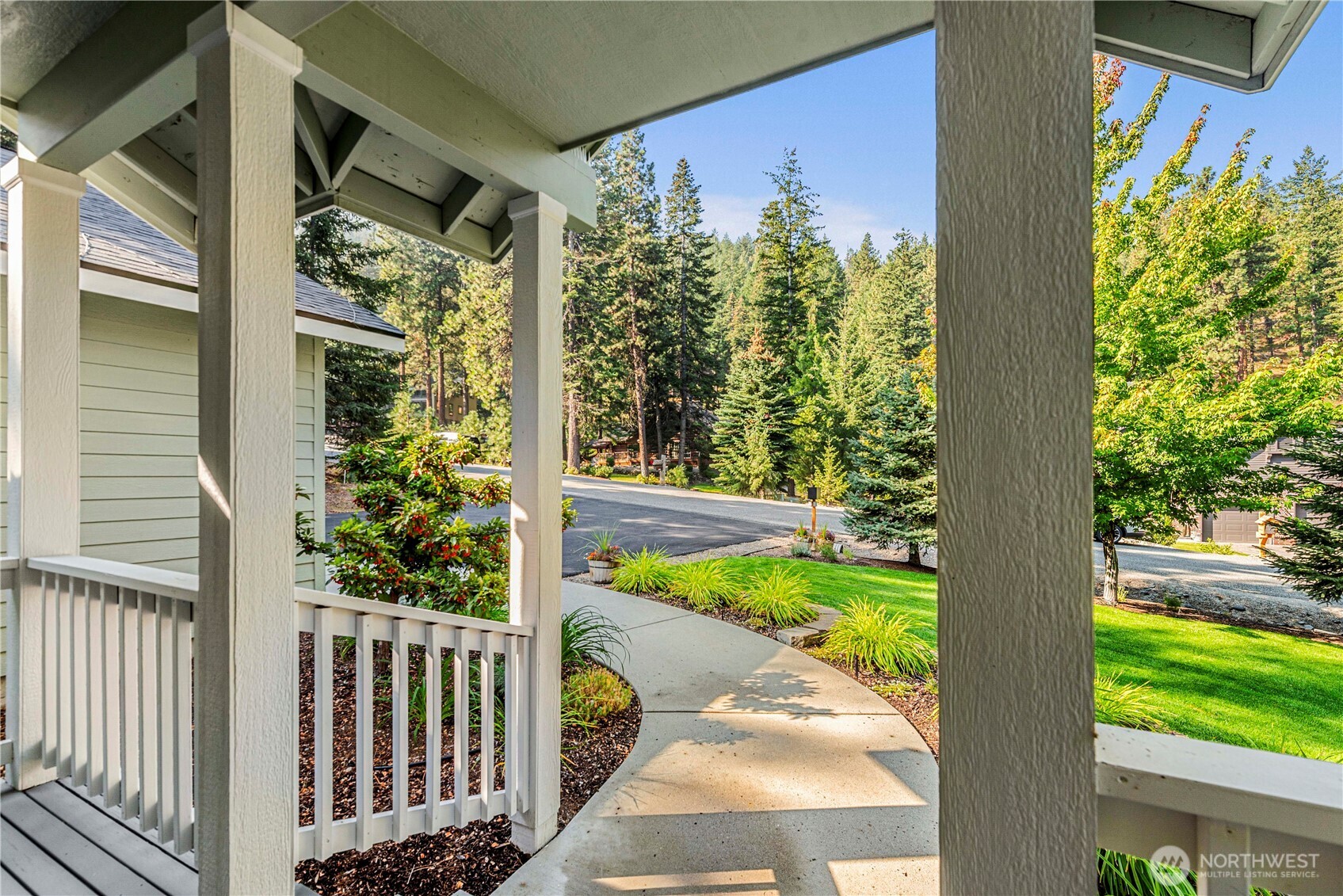 6533 Forest Ridge Drive Wenatchee, WA 98801 - Photo 6 of 37 a view of a porch and garden