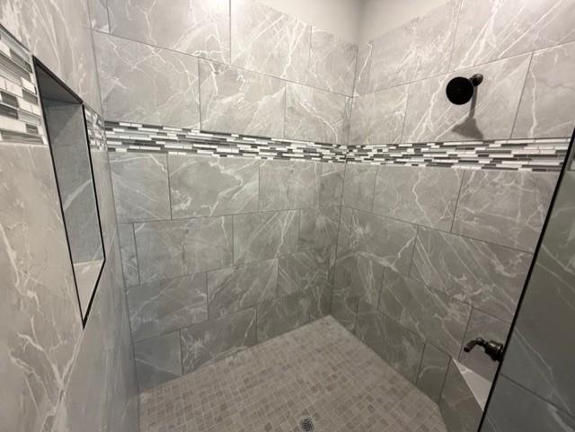 202 Coalson Crossing Azle, TX 76020 - Photo 17 of 23 a bathroom with a shower