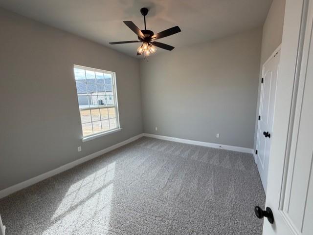 202 Coalson Crossing Azle, TX 76020 - Photo 20 of 23 an empty room with a window and a fan