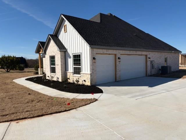 202 Coalson Crossing Azle, TX 76020 - Photo 2 of 23 a front view of a house with yard