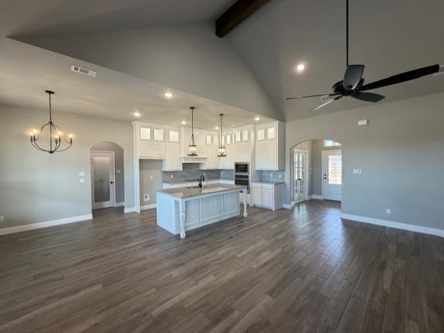 202 Coalson Crossing Azle, TX 76020 - Photo 4 of 23 a large kitchen with a lot of counter space and a refrigerator