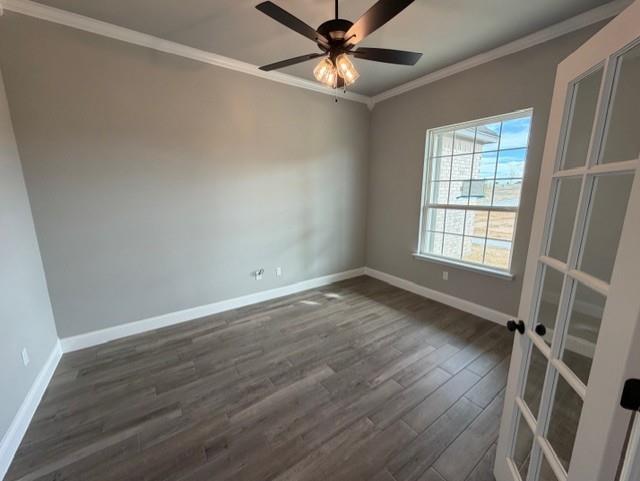 202 Coalson Crossing Azle, TX 76020 - Photo 6 of 23 an empty room with wooden floor fan and windows