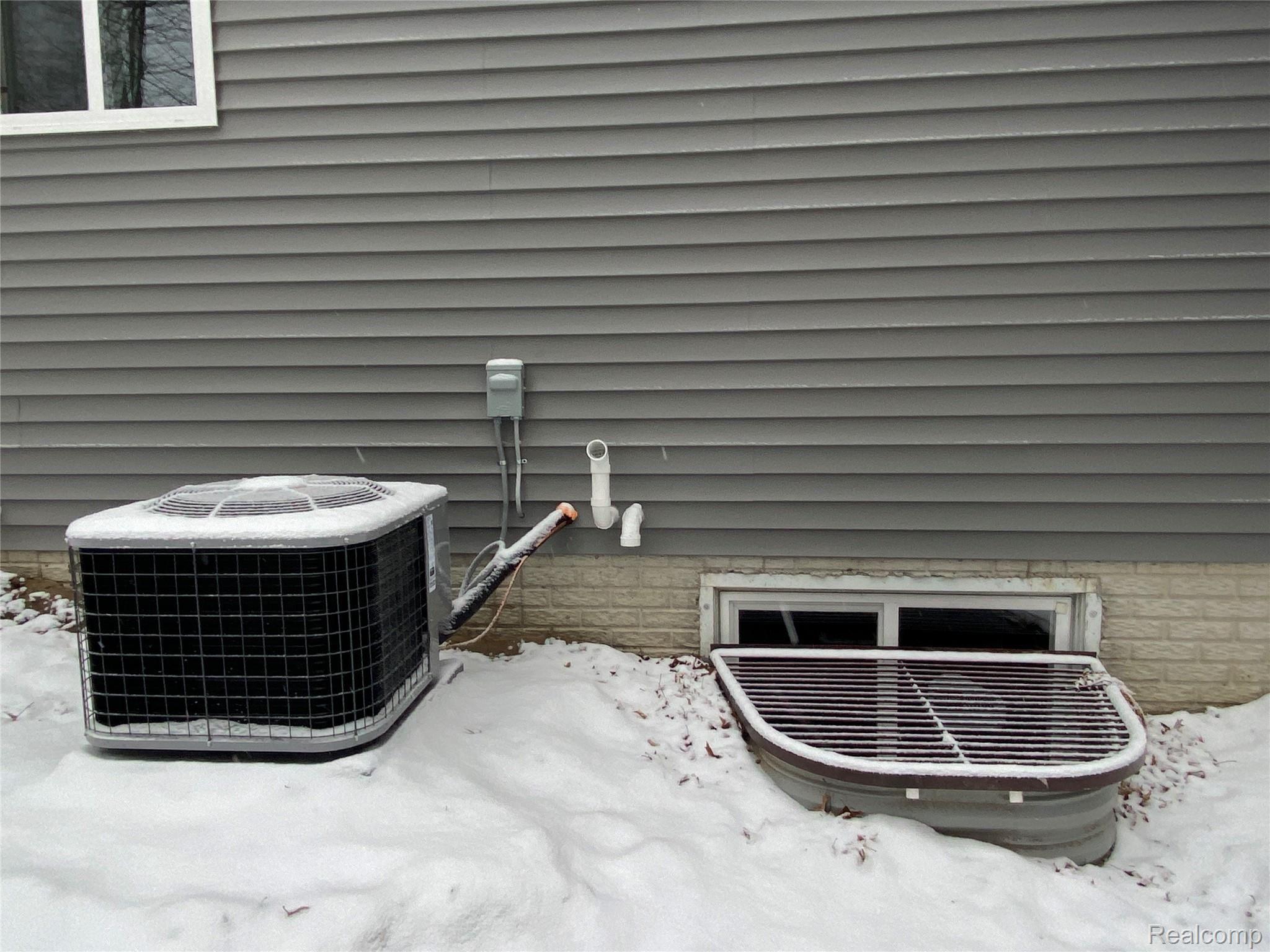 5372 Rural Terrace Waterford, MI 48329 - Photo 12 of 55 Egress Window & AC.JPG