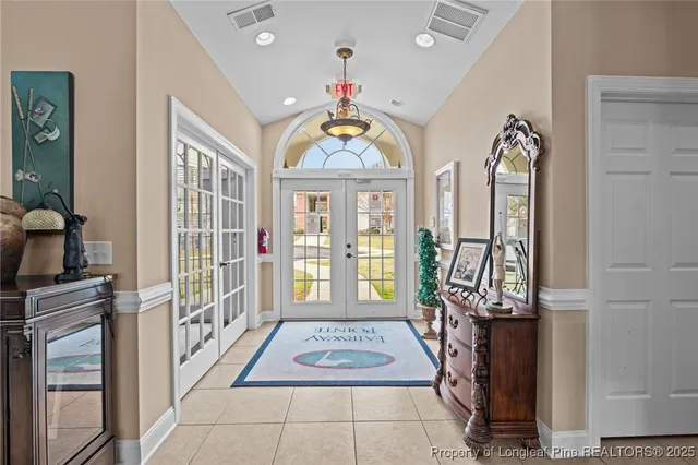 a view of entryway with a front door