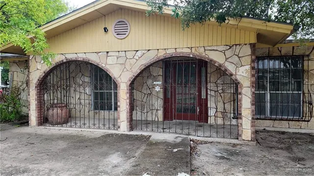 a view of entrance gate of a house