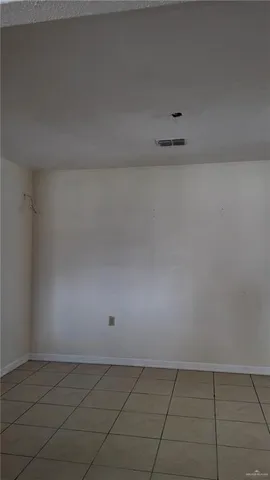 a view of granite countertop white cabinets with a sink