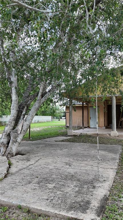 612 West Ramirez Street Rio Grande City, TX 78582 - Photo 9 of 40 a view of a house with a tree beside it