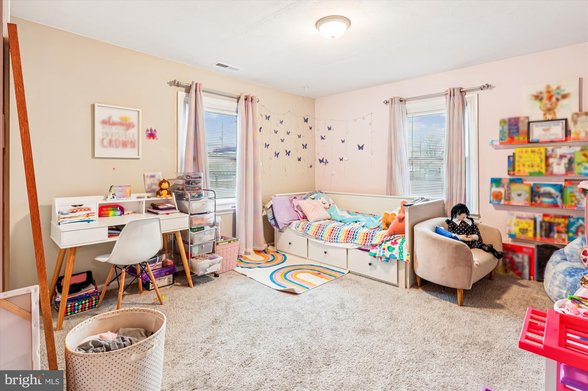 5706 Johnson Street Baltimore, MD 21225 - Photo 14 of 20 a bedroom with furniture toys and a large window