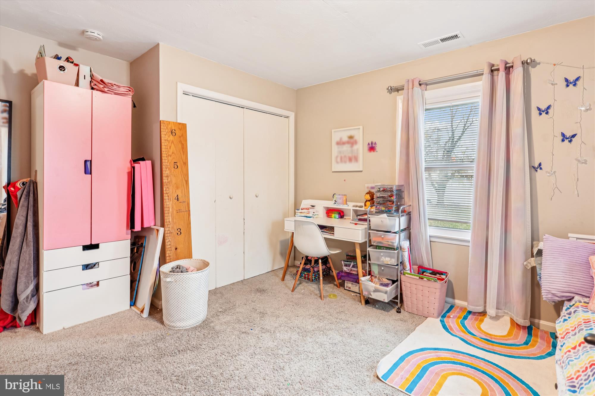 5706 Johnson Street Baltimore, MD 21225 - Photo 15 of 20 a view of a workspace with furniture and a window