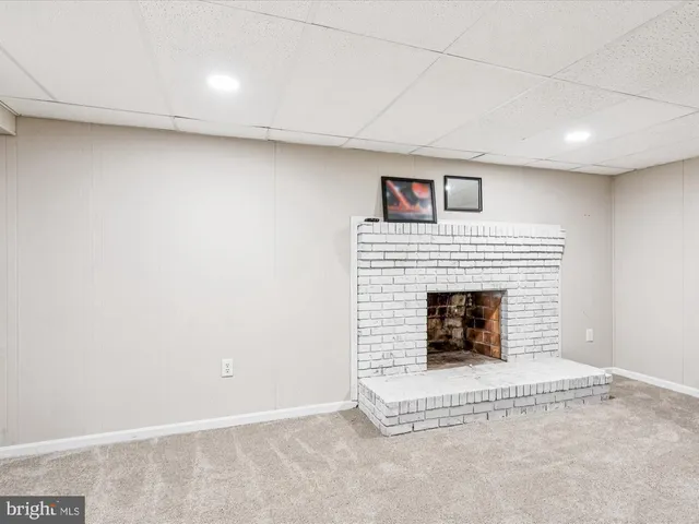 a view of a livingroom with a fireplace