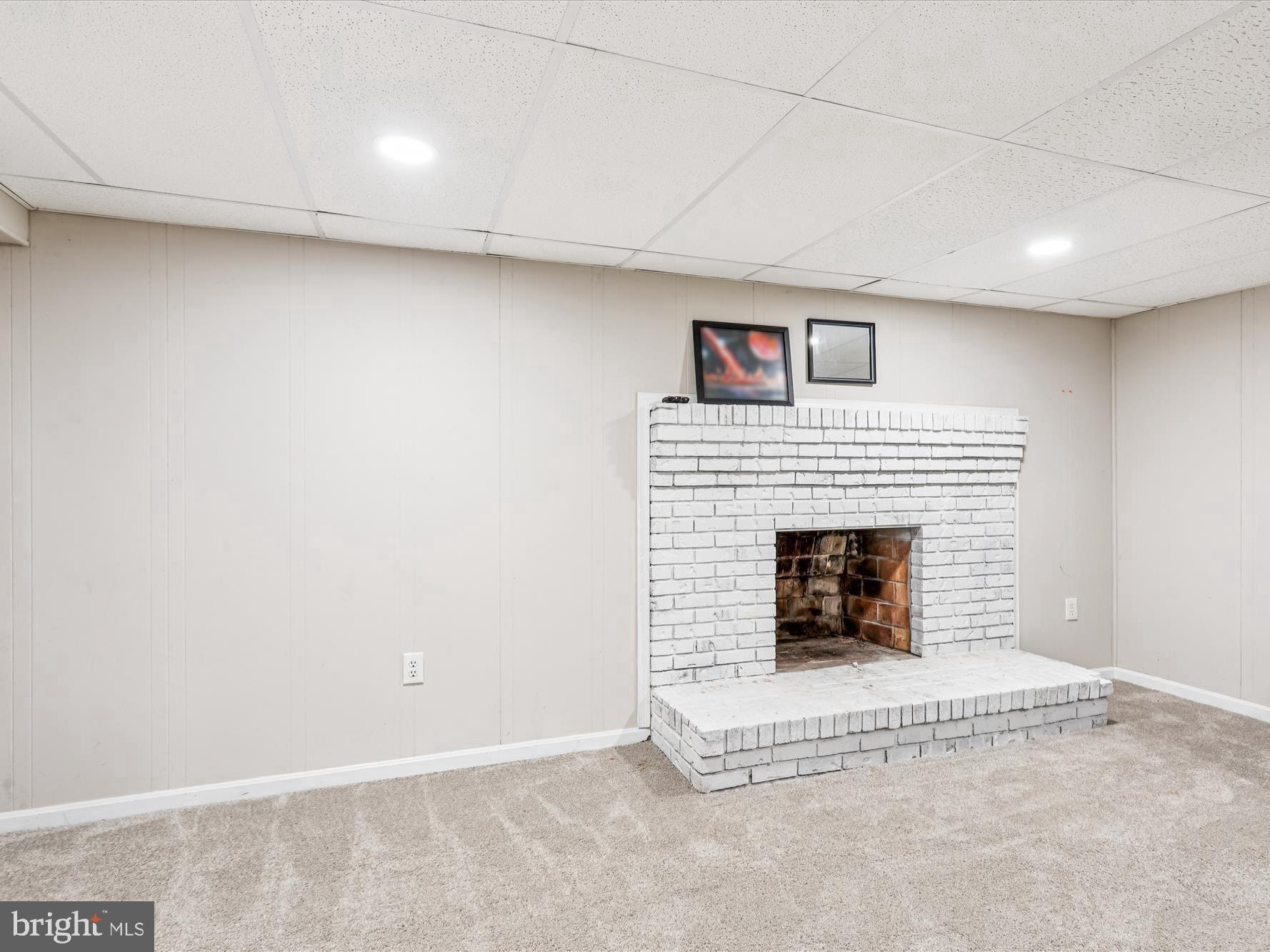 5706 Johnson Street Baltimore, MD 21225 - Photo 18 of 20 a view of a livingroom with a fireplace