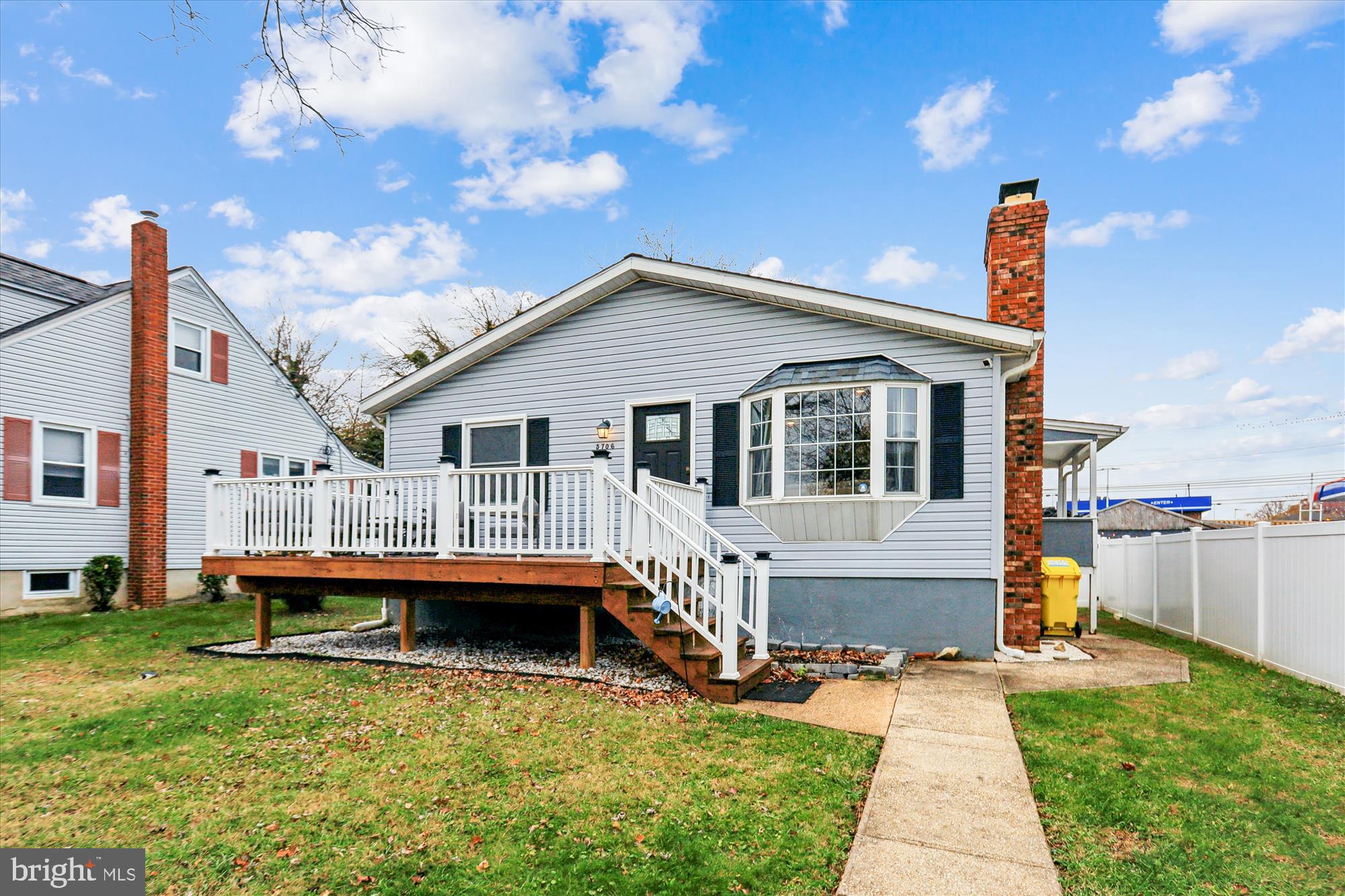 5706 Johnson Street Baltimore, MD 21225 - Photo 2 of 20 a front view of a house with swimming pool