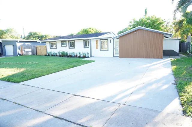 a house view with a garden space